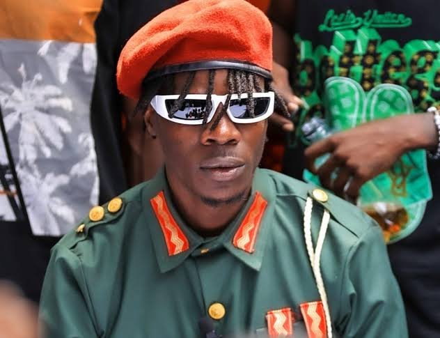 VIDEO!! Reckless Alien Skin Survives Being Shot After Knocking Promoter Bajjo’s Car